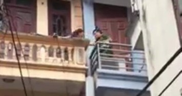 Giải cứu thành công người phụ nữ tưới xăng dọa thiêu tại Hà Nội