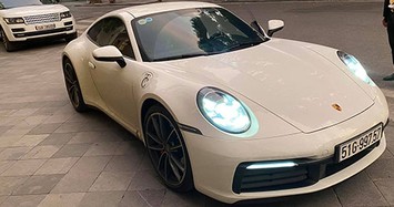 Vợ chồng Cường Đô la chạy Porsche 911 gần 8 tỷ đồng ra Bắc