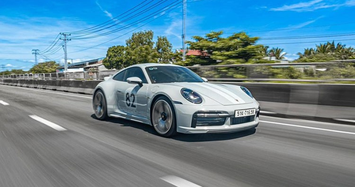 Đàm Thu Trang nay tự tin cầm lái Porsche 911 Sport Classic