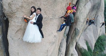 Cặp đôi liều mạng trèo cao hơn 100m để chụp ảnh cưới